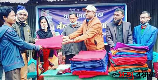 শেরপুরে আদিবাসী দুস্থ কোচদের মাঝে ডিভাইন এর শীত বস্ত্র বিতরণ